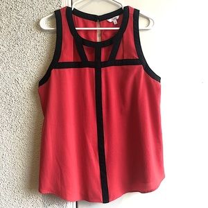 Salmon colored sleeveless blouse